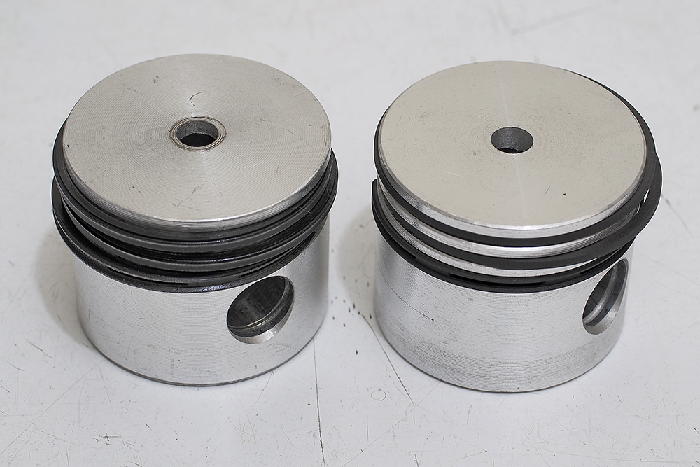 1557503857_18619605985cd59f712a5314.82317988_new and old piston 2.jpg