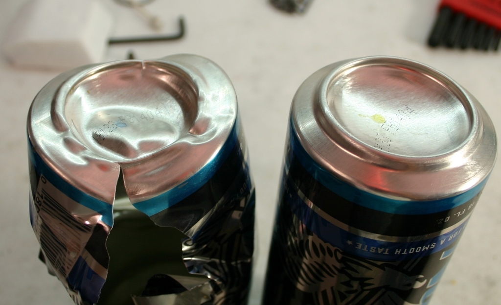 1561418043_4262351535d11593b088303.07336019_Can_Smashed_Bottom.jpg