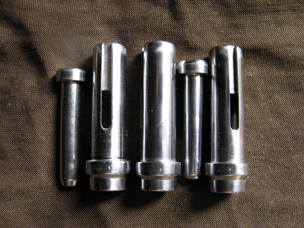 1569715778_14812626875d8ff642543dd1.42529304_Left is stock hammer and guide right two are mine.JPG