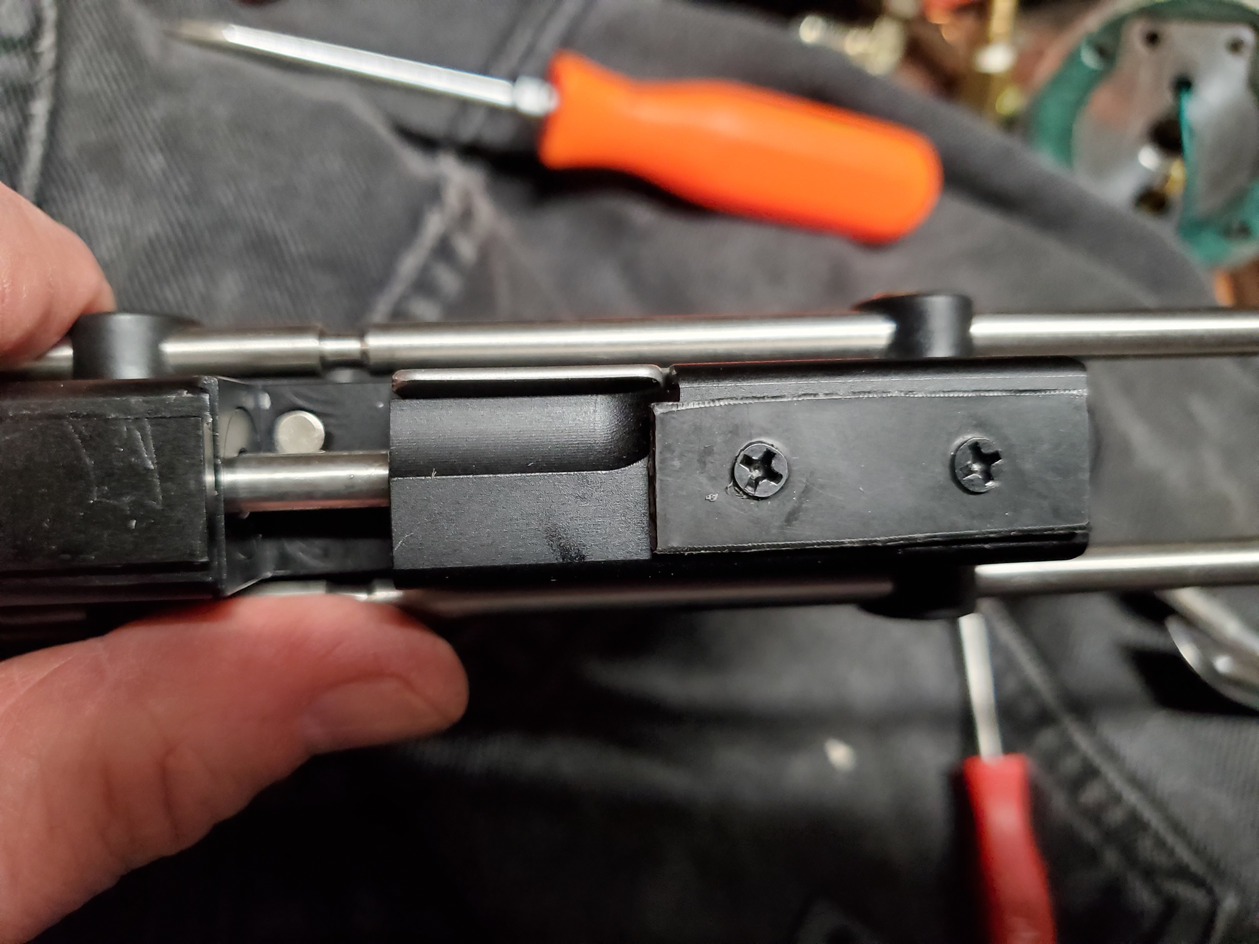 Rear sight removal plate covers cocking lever pin.jpg